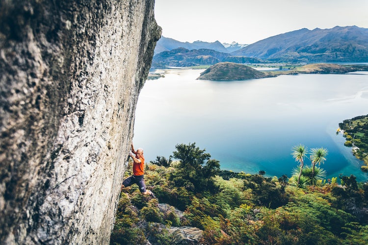 Rock climbing and bouldering above an alpine lake with mountain scenery — the technical vocabulary of movement that translates to every type of stone, Yosemite granite included