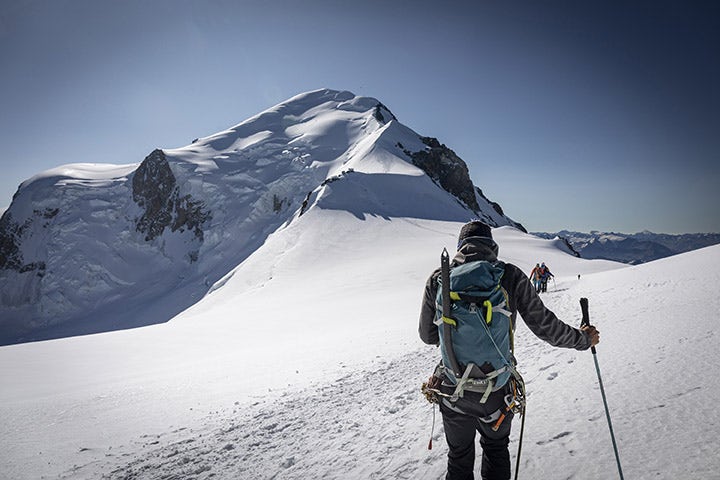 Alpinist ascending Mont Blanc — the kind of frame you wait hours for, then have six seconds to compose